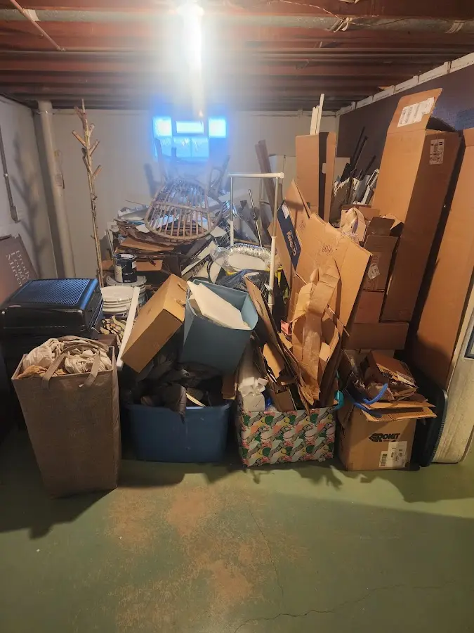 Roll-off dumpster container at job site for Cleanout Dumpster Rental in Ida